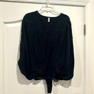 Free People black embroidered flouncy bodysuit!
